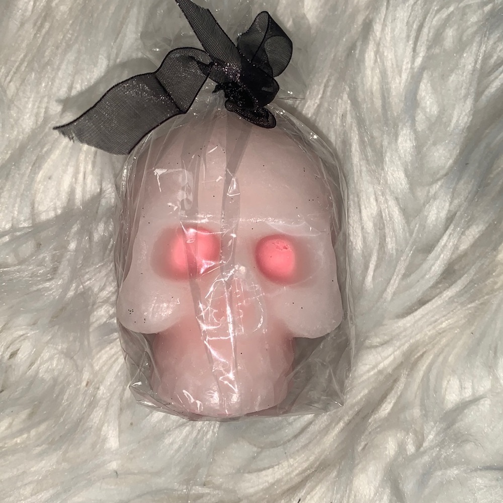 BNWT Pink spooky skeleton candle